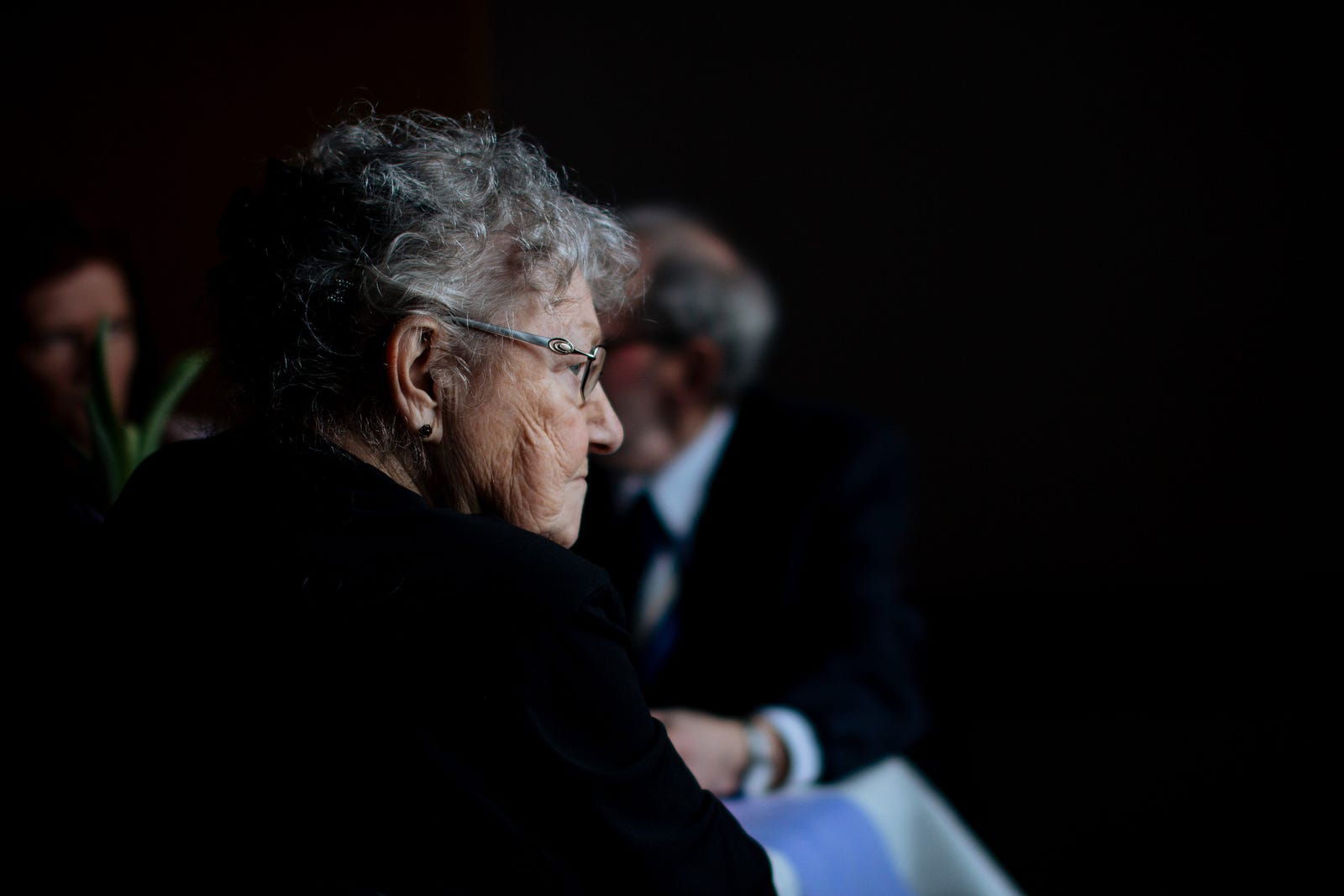 An elderly woman.